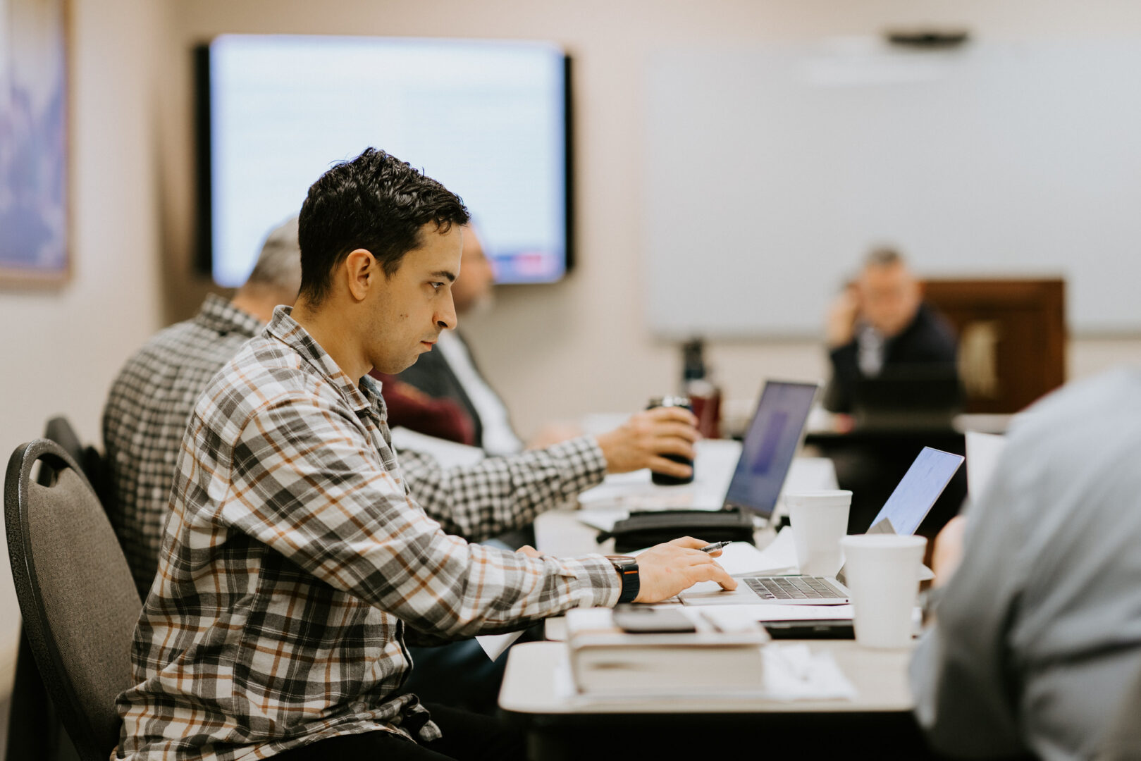 A PhD student participates in his seminar